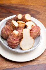 Group of fresh uncooked topinambur or Jerusalem artichoke roots