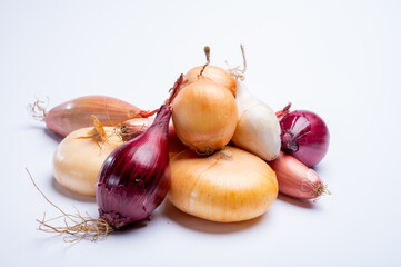 Onion collection, flat onion borretana from Spain, french Shallot, white and purple onion on white background