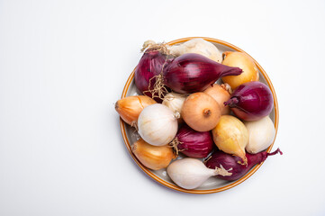 Onion collection, flat onion borretana from Spain, french Shallot, white and purple onion on white background