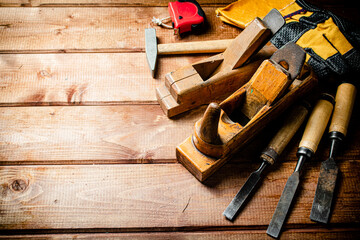 Various working tools on wood on the table. 