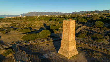 amanecer en la playa de Cabopino y las dunas de Artola junto a torre ladrones, Marbella	