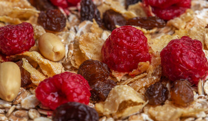 muesli nuts, raisins, fresh ,berries and flakes