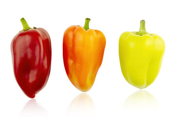 Pepper. A set of fresh peppers isolated on a white background. Three peppers on a white background, red, orange, yellow. Delicious fresh food, veganism, diet, healthy eating, healthy and delicious