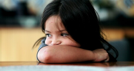 Sad child suffering from depression pensive little girl