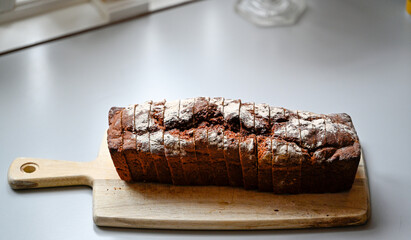 homemade baked and sliced bread in kitchen
