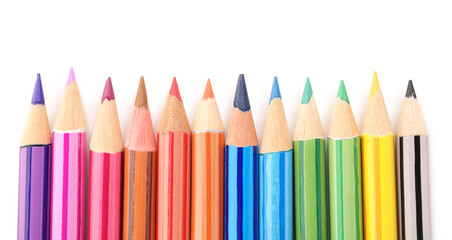 Set of colorful pencils on white background, top view