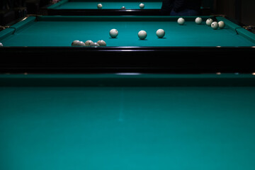 Sports game of billiards on a green cloth