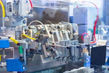 Abstract industry, engineering, machinery, manufacturing, production process and automated technology concept - close up view - parts of hydraulic industrial automotive machine tool equipment