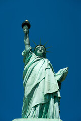 Fototapeta premium Statue of Liberty and blue skies
