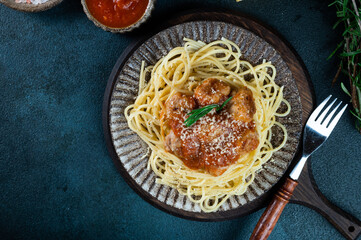 Spaghetti pasta with meatballs and tomato sauce. Top view. Italian food. Italian pasta with meatball. Pasta bolognese