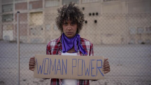 Woman holding a sign Women Power. Nationwide women's strike. High quality photo