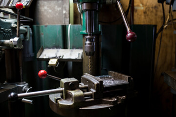 Part machining with drilling machine