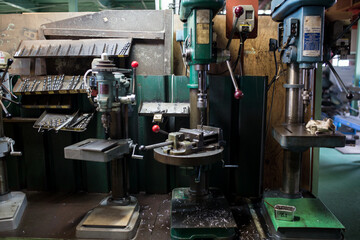 Part machining with drilling machine