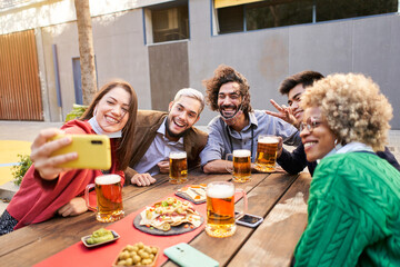 Selfie of young smiling teenagers having fun together. High quality photo