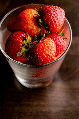 Strawberries, blueberries, lemons, limes, oranges and pineapple. Cooking ingredients from a farmers markets, Fresh Fruits and vegetables. Classic ingredients and garnishes used in restaurant cooking.