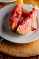 Charcuterie board. Cheese Plate or board. Assortment on cured and salted deli meats and cheeses, pastrami, salami, prosciutto served with olives and dried fruits. Classic traditional party favorite.  