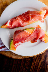 Charcuterie board. Cheese Plate or board. Assortment on cured and salted deli meats and cheeses, pastrami, salami, prosciutto served with olives and dried fruits. Classic traditional party favorite.  