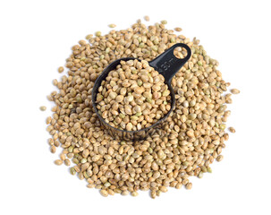 Heap of hemp seeds isolated on white background