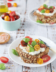Sandwiches with cherry tomatoes and cottage cheese