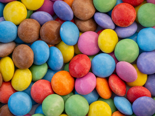 Candy close-up. Colored background.