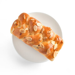 Brioche loaf bread with sliced almond. There are photo and vector versions for design idea. Unlike American styles, French bread is delicious and softer. The bread has a bouncy, spongy texture.