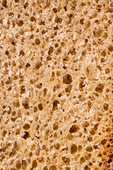 The flesh of fresh bread. Macro background. 