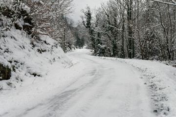 dangerous mountain road due to winter conditions
