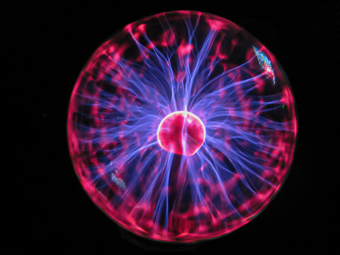 Blue and purple beams from the plasma ball	
