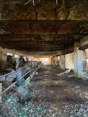 Fototapeta na wymiar Abandoned stable in a old farm