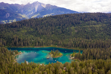 Aerial view of Caumer Lake in Graubunden canton late afternoon, flims, Graubunden, Switzerland