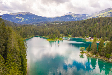 Aerial view of Caumer Lake in Graubunden canton late afternoon, flims, Graubunden, Switzerland