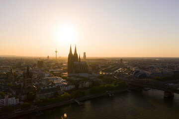 Fototapeta premium View of Cologne, the Rhine river and Cathedral by sunset