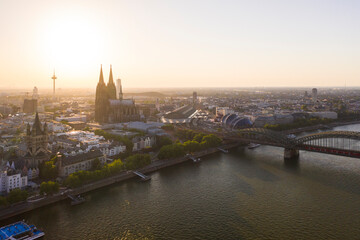 Fototapeta premium View of Cologne, the Rhine river and Cathedral by sunset