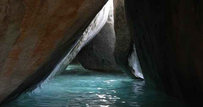 Virgin Gorda Caribbean ocean water Baths rocks cave. British Virgin Islands. Cruise ship vacation destination. Geologic formation, the Baths, makes BVI major tourist destinations. Resort vacation.