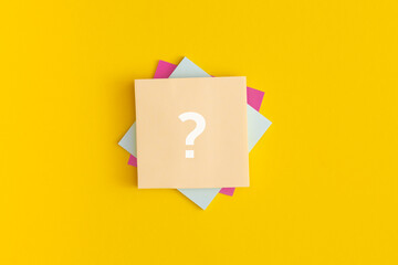 Mock up sticky notes on yellow background. Question mark