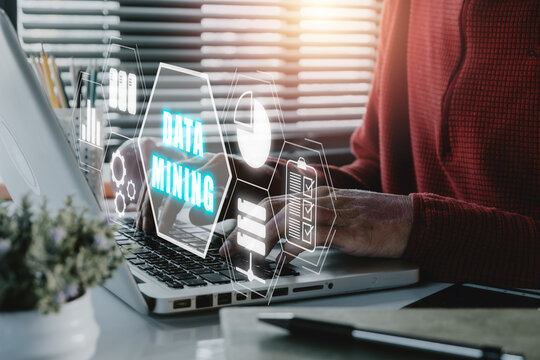 Data mining banner web icon for business and organization, Businessman working on laptop computer with data mining icon on VR screen, internet and networking concept.