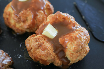 Scone with caramel on top. Fresh yummy tasty delicious Traditional British bakery for tea time.
