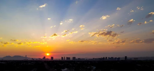 Foto op Plexiglas sunset over the city © Lori