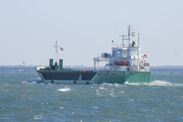 Obraz premium A big portuguese cargo ship sails the sea