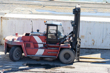 Forklift with empty cab in the shipping port
