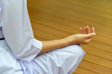 white robes in meditation poses - yoga - practice dharma