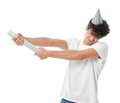Emotional Young Man With Party Popper On White Background