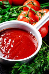 Tomato sauce in a sauce roll with parsley. 
