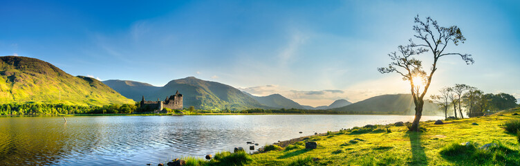 The ruins of Kilchurn castle on Loch Awe at sunset in Scotland