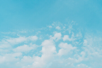 Abstract pastel blue sky with white cloud background.