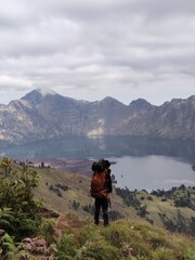 Fototapeta premium Hikers in the mountains again enjoying the view