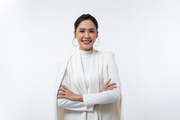 Elegant confident young Asian businesswoman with arms crossed isolated in white background.