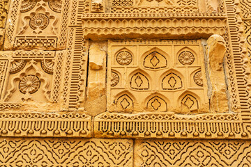 Thatta, Sindh, Pakistan - October 2021: Beautiful traditional intricate geometric and floral carved stone detail, decoration, in a royal mausoleum in Makli necropolis