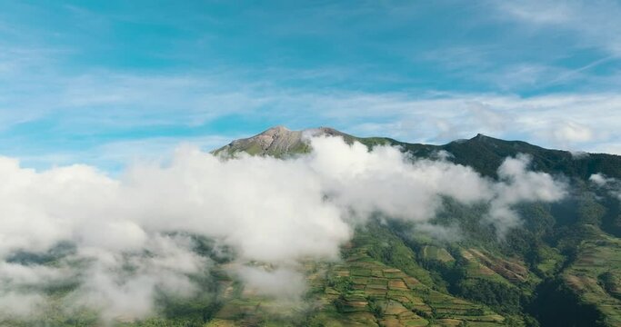 Aerial drone of agriculture and farmland in a mountainous area near the Canlaon volcano. Negros, Philippines