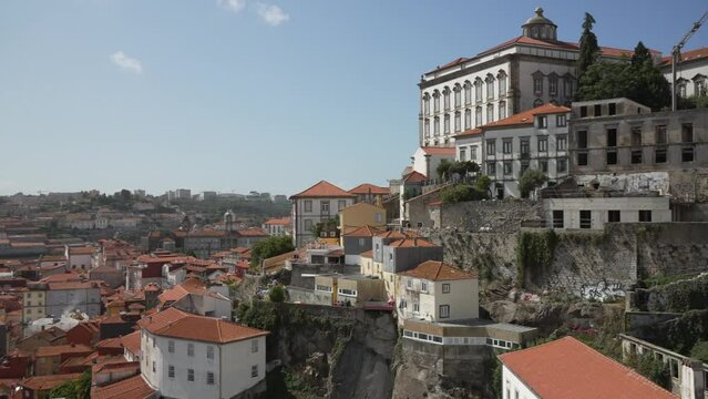 Paco Episcopal do Porto across terracotta rooftops to the Douro River from Dom Luis I Bridge